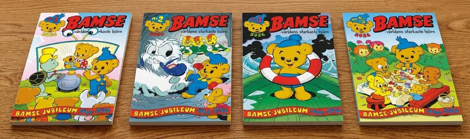 Four classic Bamse comic books laid out on a wooden table