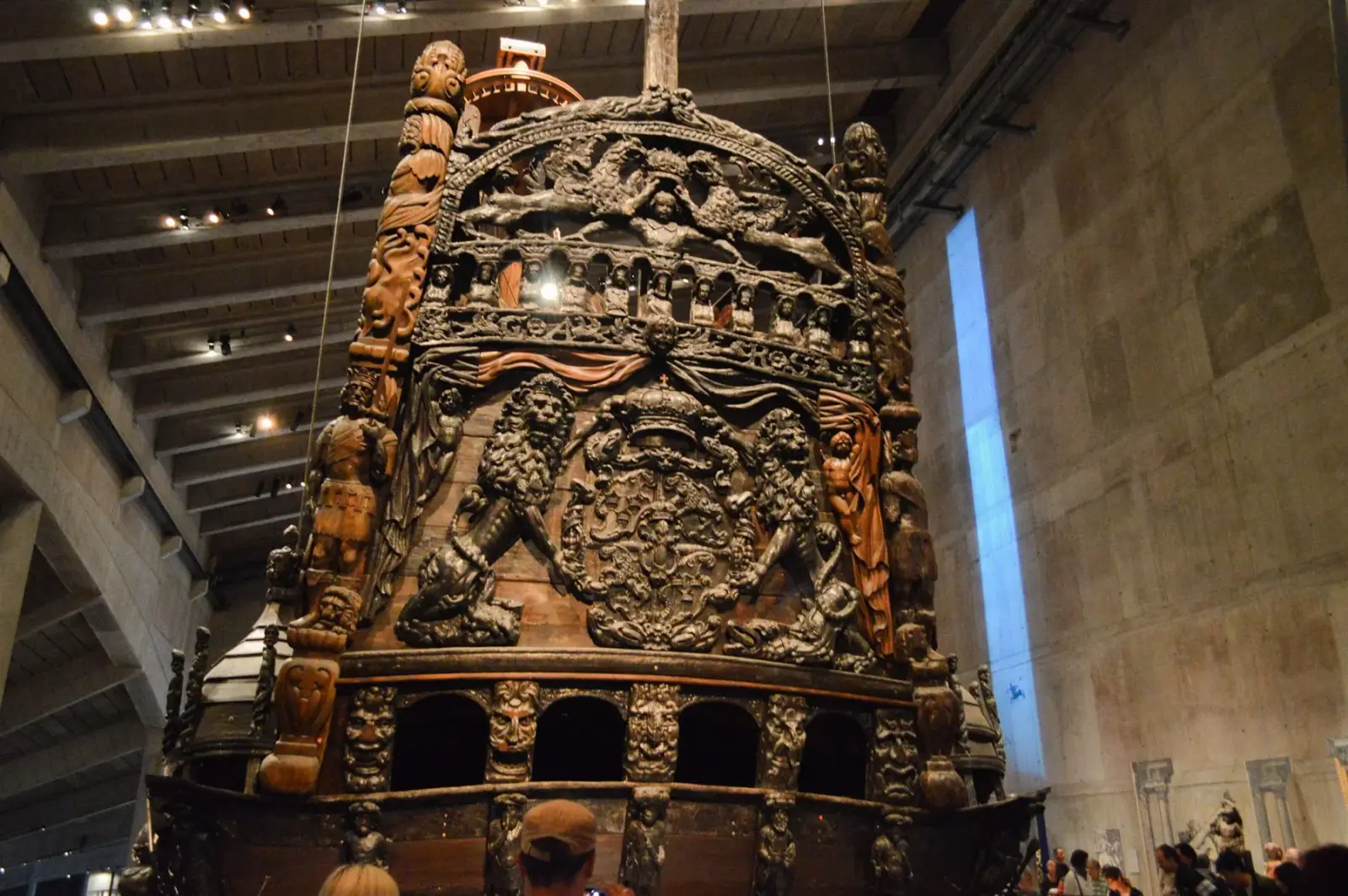 The richly decorated stern of the Vasa ship inside the museum