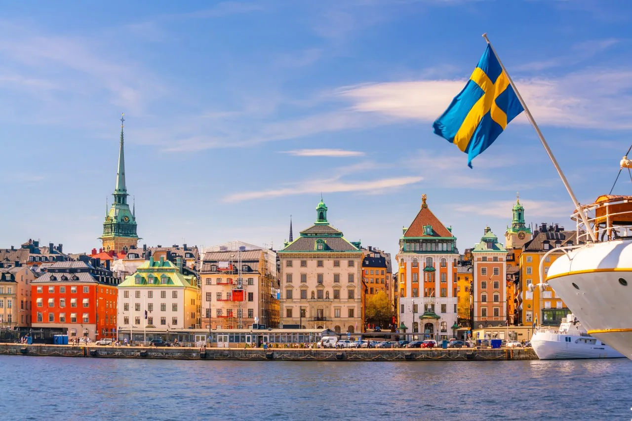 Stockholm waterfront with Swedish flag