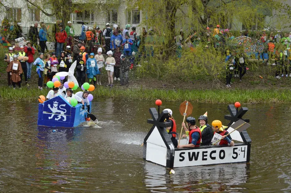 Homemade rafts on the Fyris River during Forsränningen in Uppsala